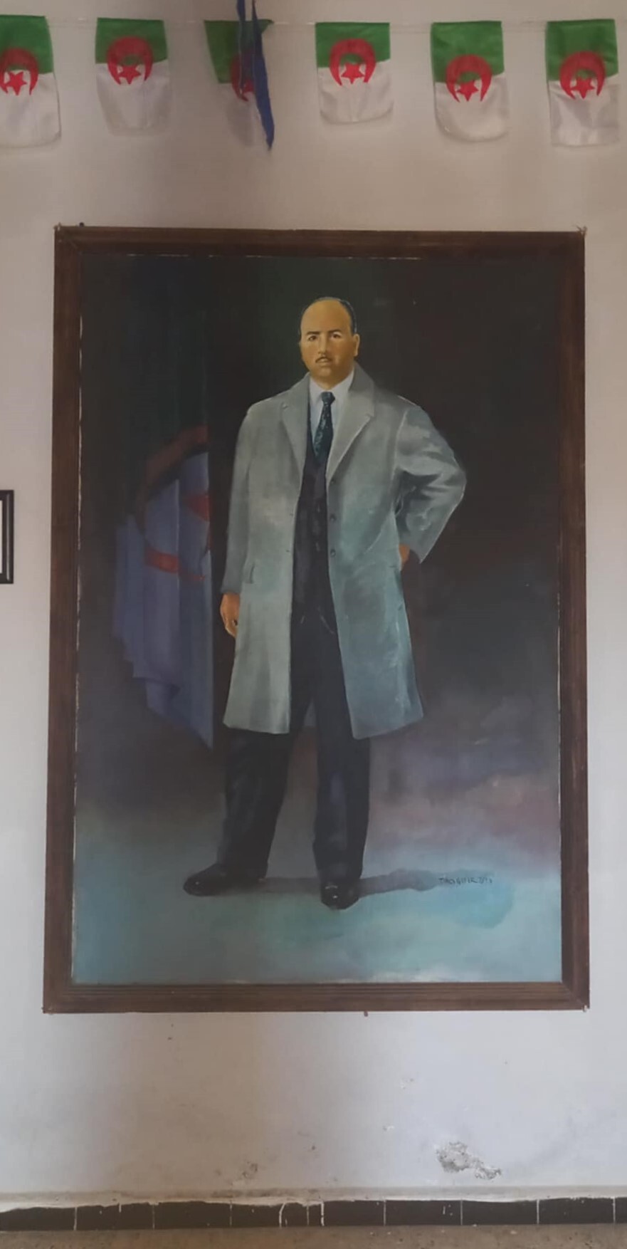 لوحة لكريم بلقاسم معلقة في المنزل العائلي الذي تحول إلى متحف. 17 أكتوبر 2024. صورة: ماجيد صرّاح